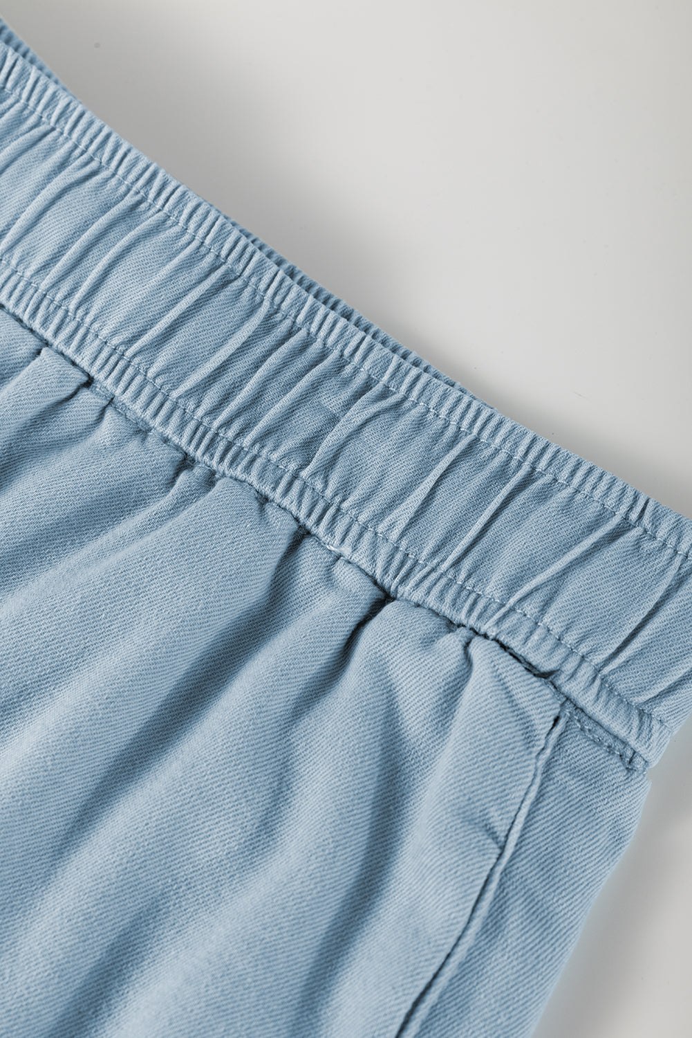 Washed chambray elastic waistband with stitched seam detail, blue