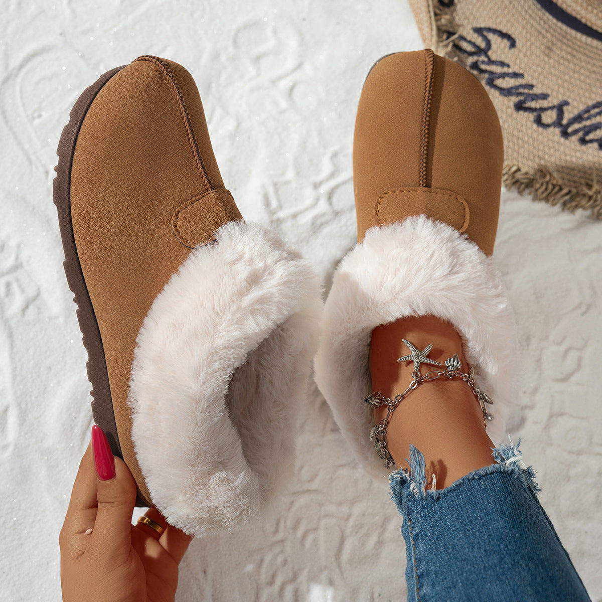 Women's snow boots in tan suede with white faux-fur lining and side strap