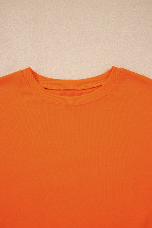 Orange varsity stripe pullover crew neck with ribbed neckline