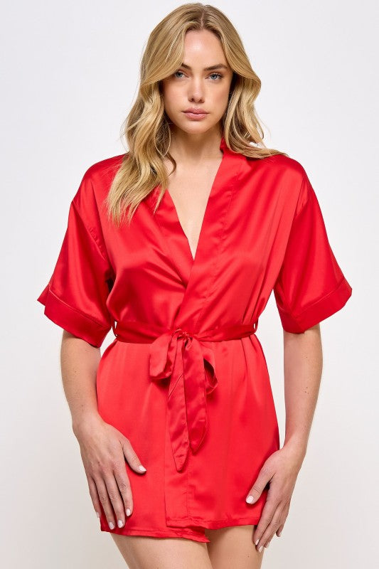 Red satin V-neck robe with tied waist belt and short sleeves
