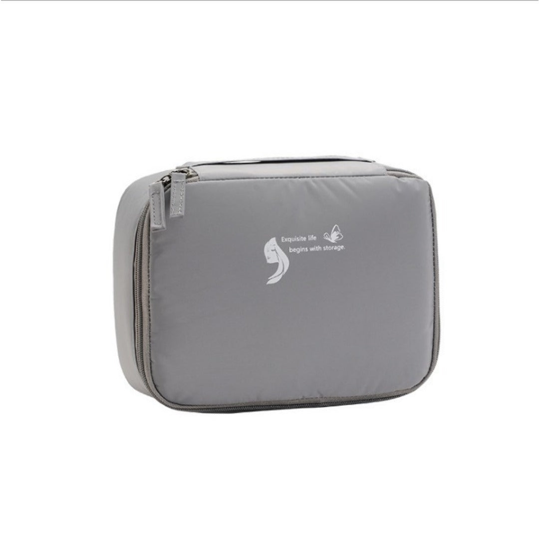 Gray square waterproof cosmetic bag with zipper closure and front logo