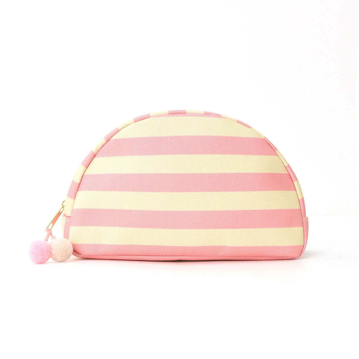 Striped shell makeup bag in pink and cream with pom-pom zipper pull.