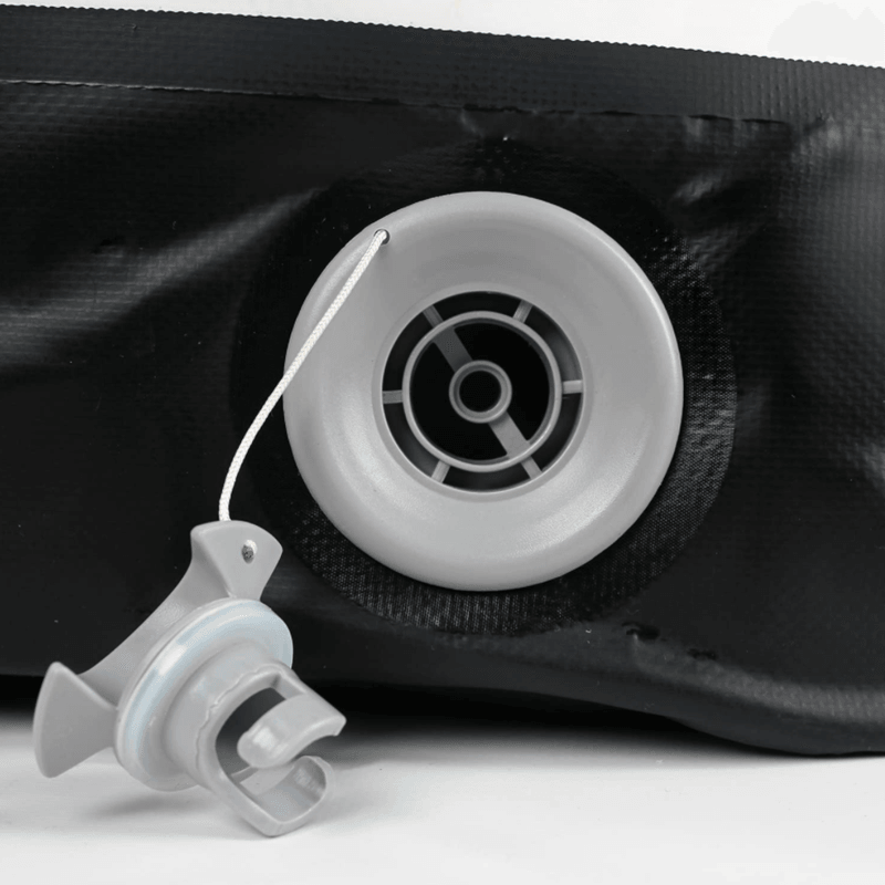 White cooler bag drain valve with cap and black rim