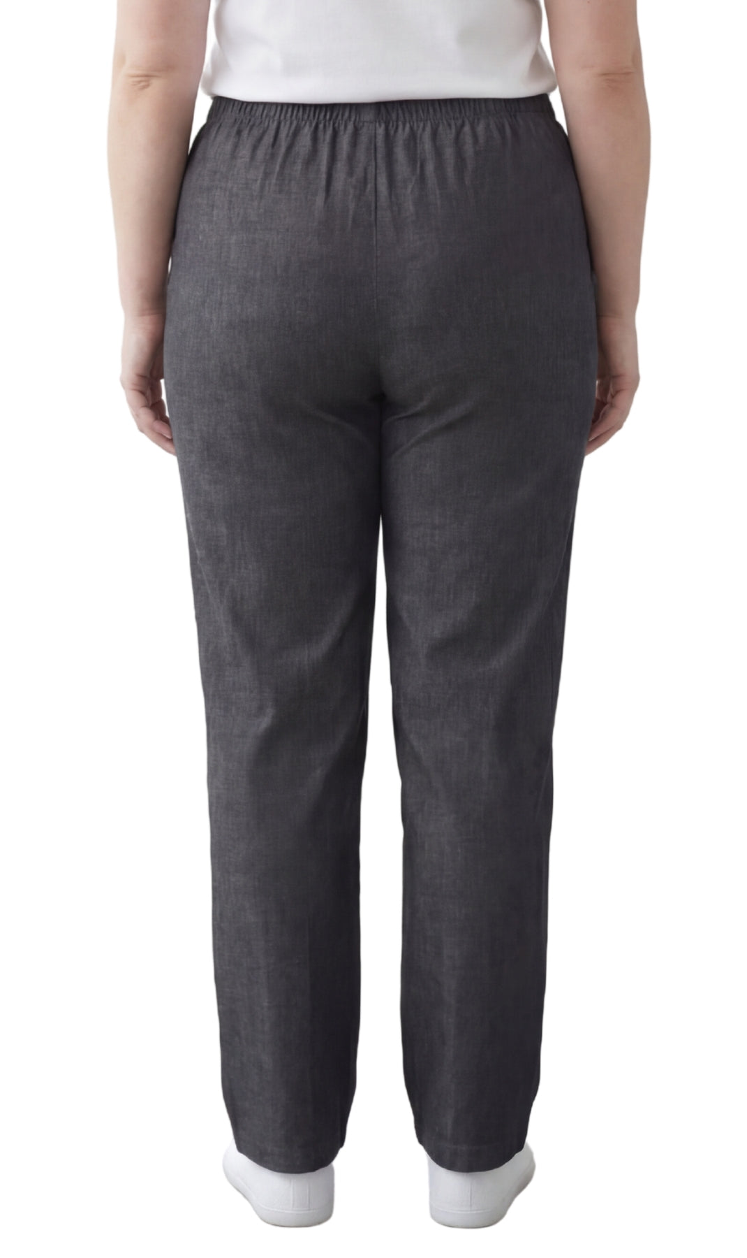 Dark gray pants worn by a person on a white background