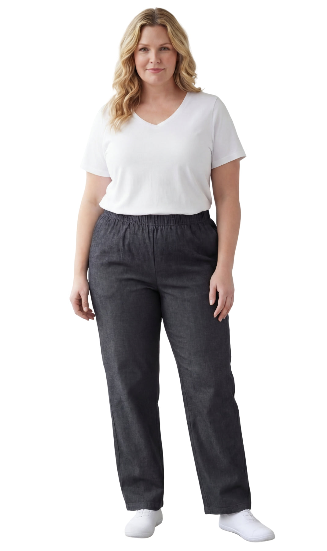 Woman wearing a white top and dark gray pants on a white background