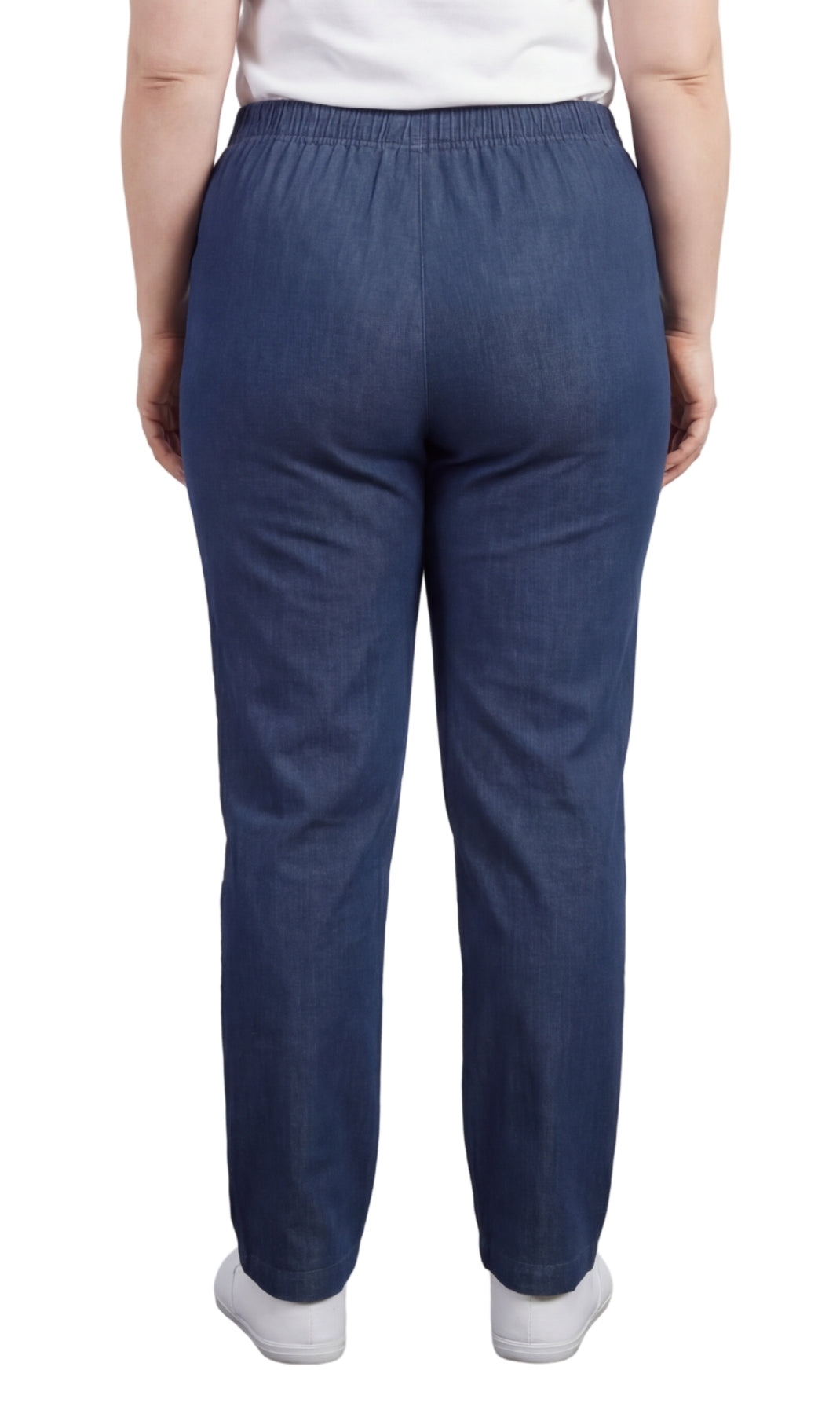 Blue pants worn by a person on a white background