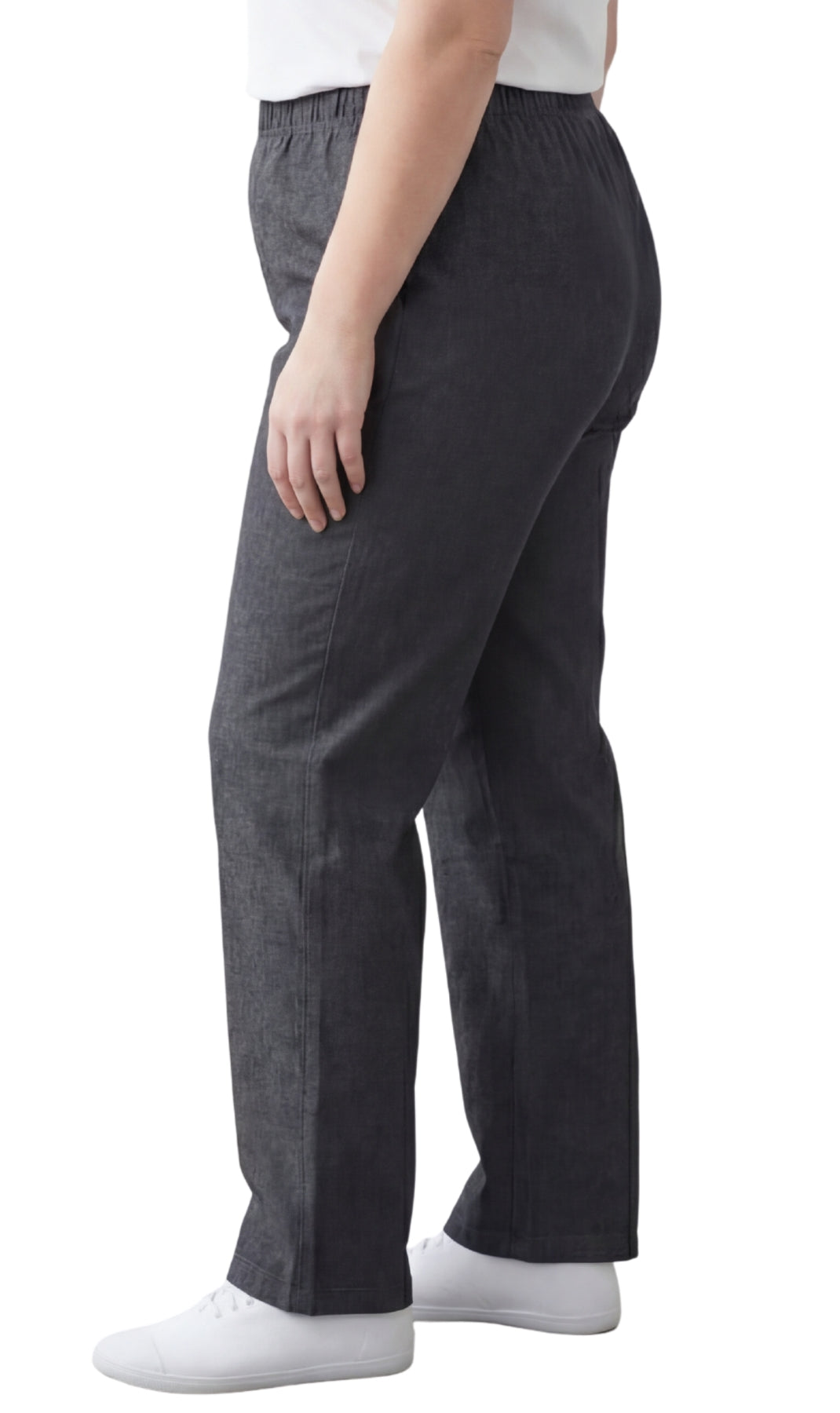 Person wearing dark gray pants on a white background
