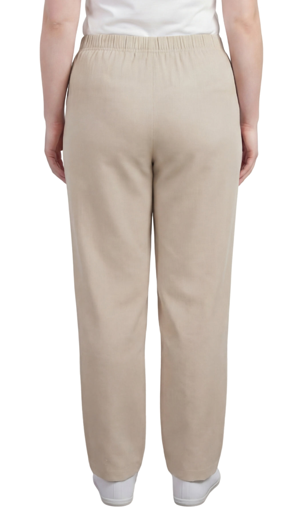 Beige pants worn by a person on a white background