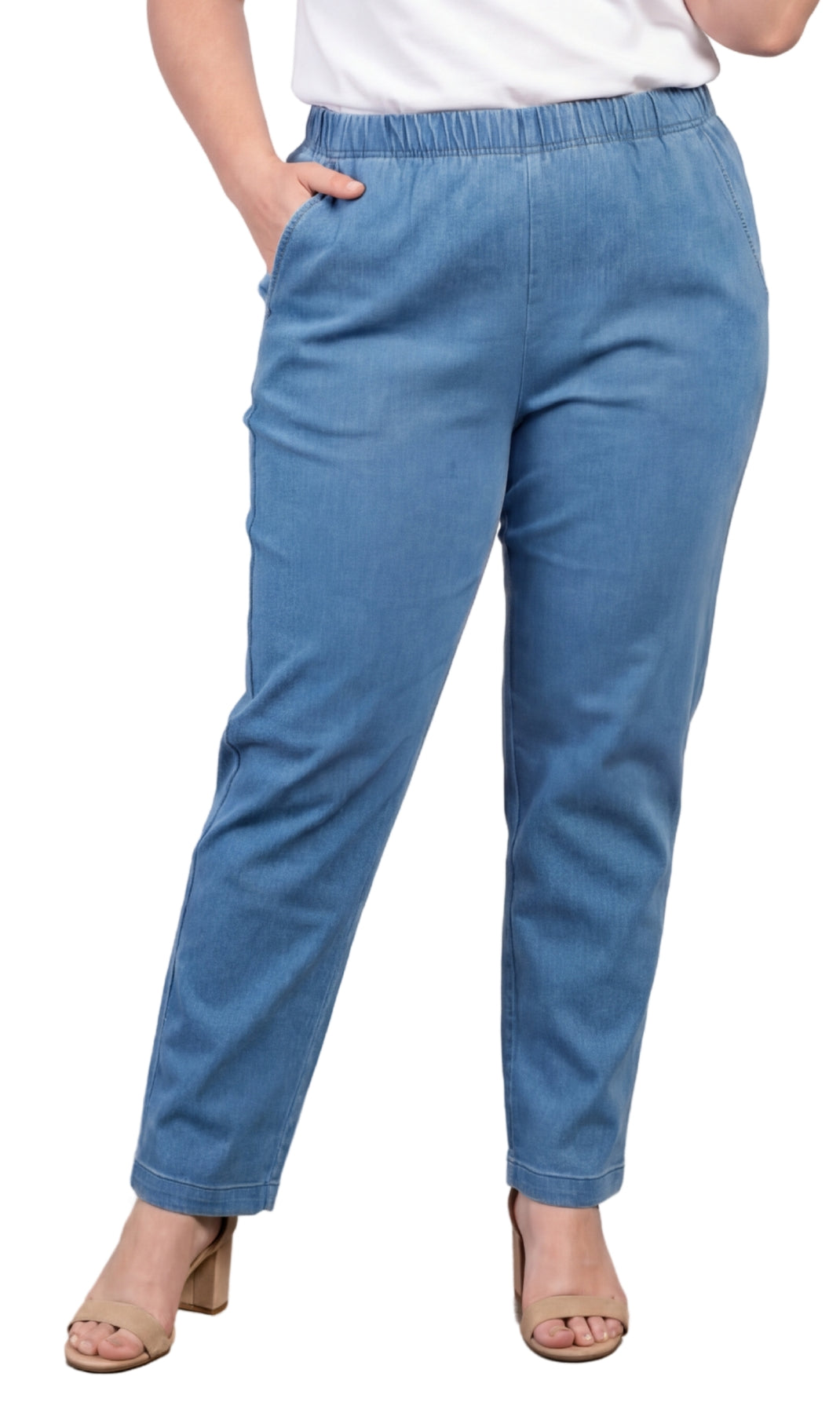 Blue pants worn by a person on a white background
