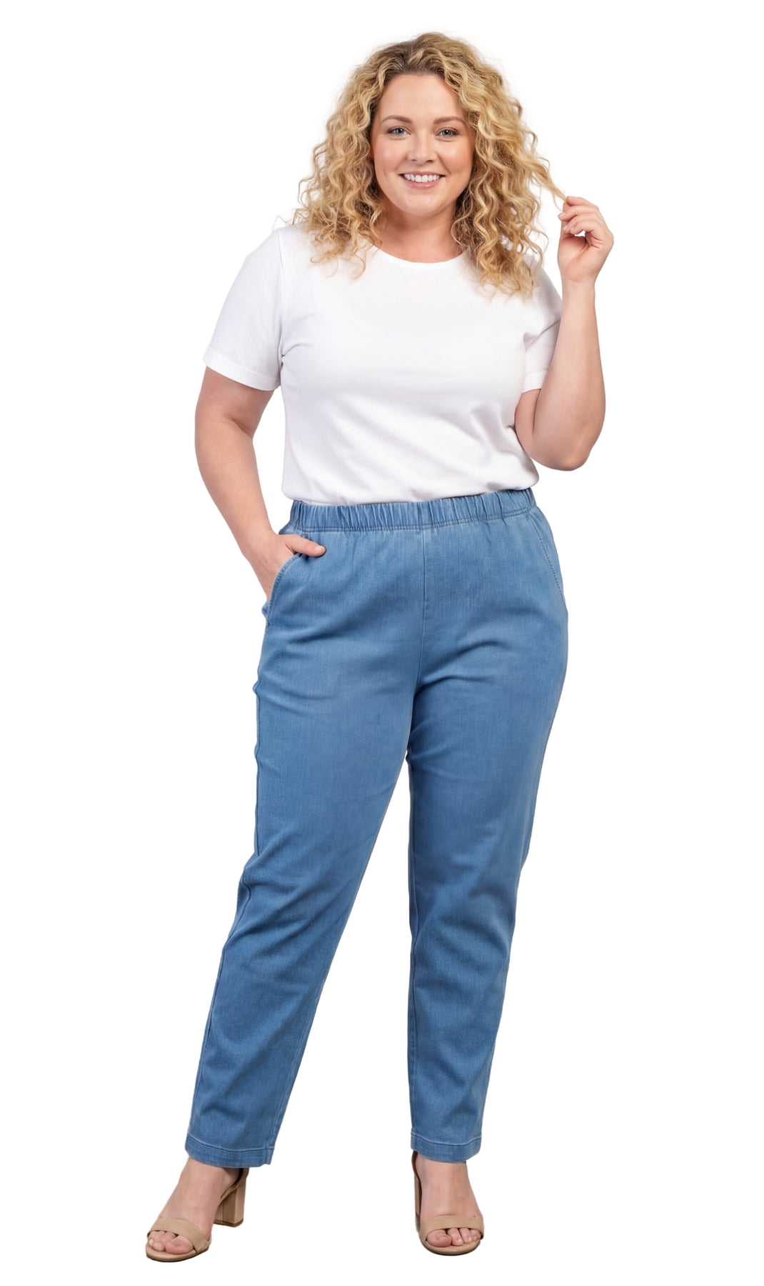 Woman wearing a white t-shirt and blue pants on a white background