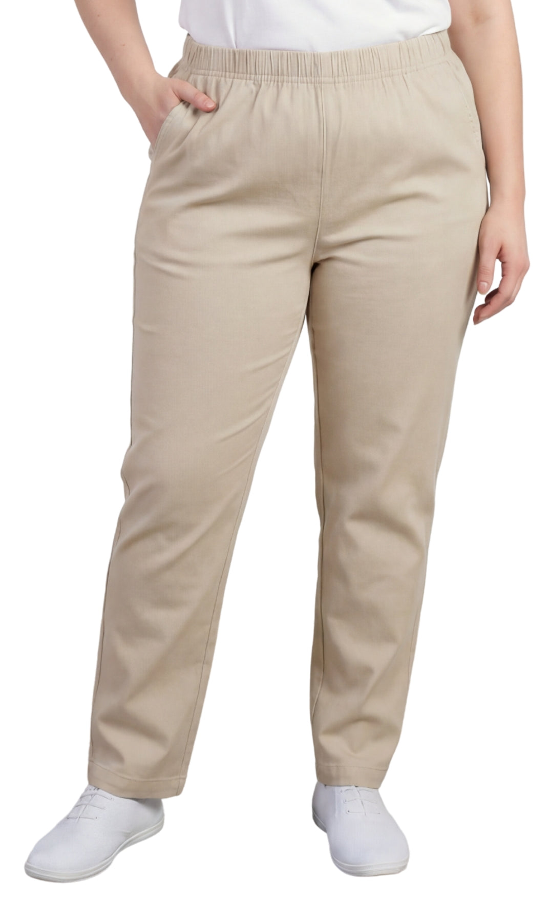 Beige pants worn by a person on a white background