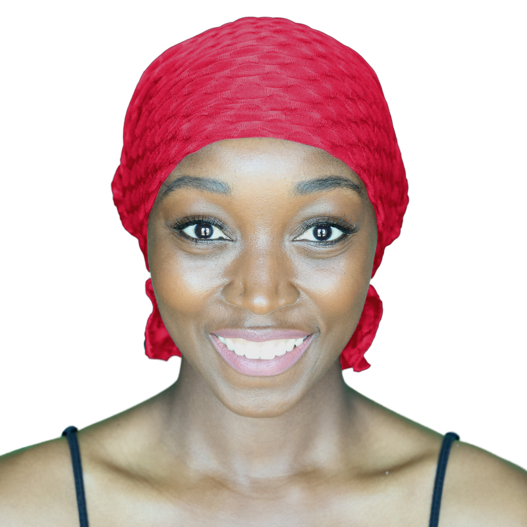 Red chemo beanie with textured knit, wrapped fit and small side tail