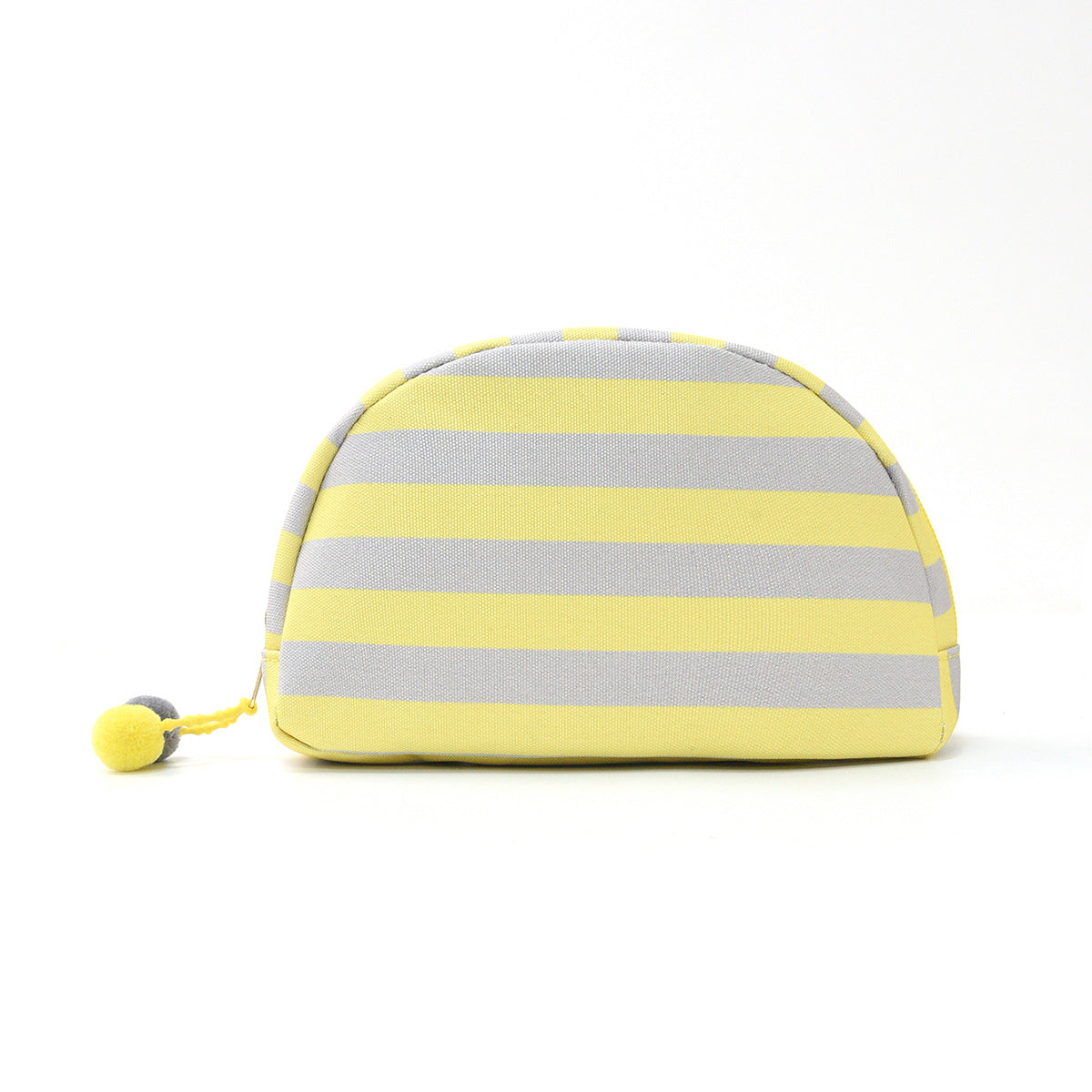 Striped shell makeup bag with yellow and gray horizontal stripes and pom-pom pull.
