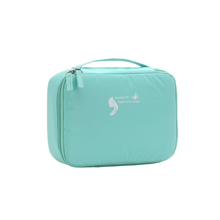 Light green square waterproof makeup/toiletry bag with zippered top and handle.