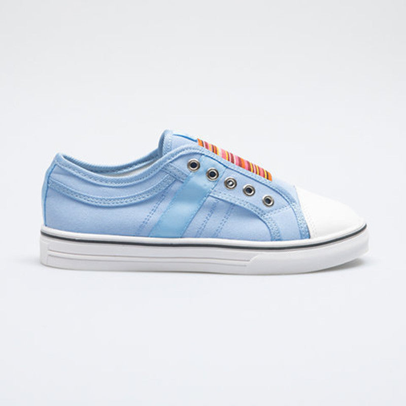 Light blue canvas round-toe sneakers with elastic gore and rainbow stripe detail, white sole