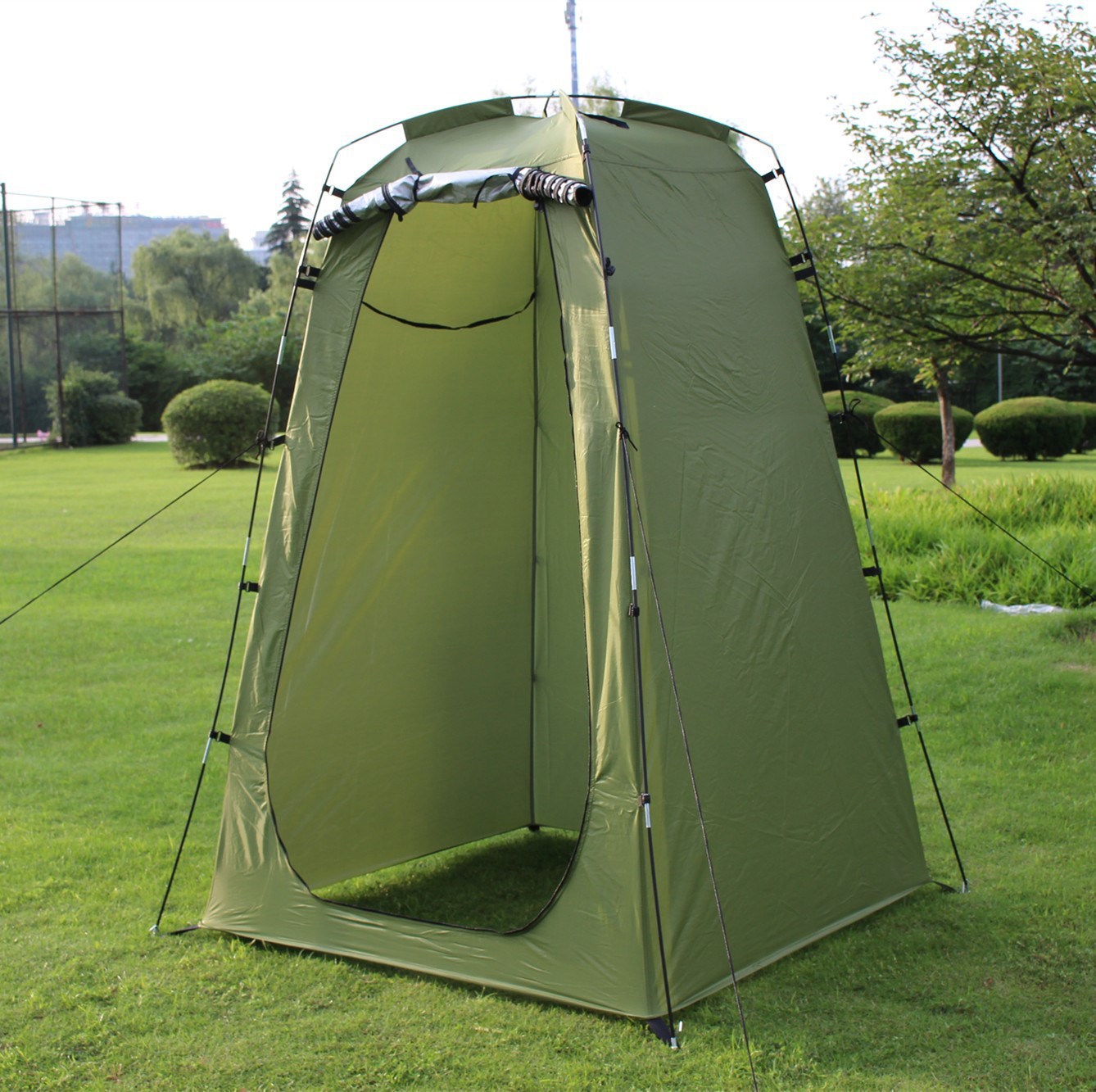Green shower/toilet camping tent with open front, dark floor panel, dome top vent