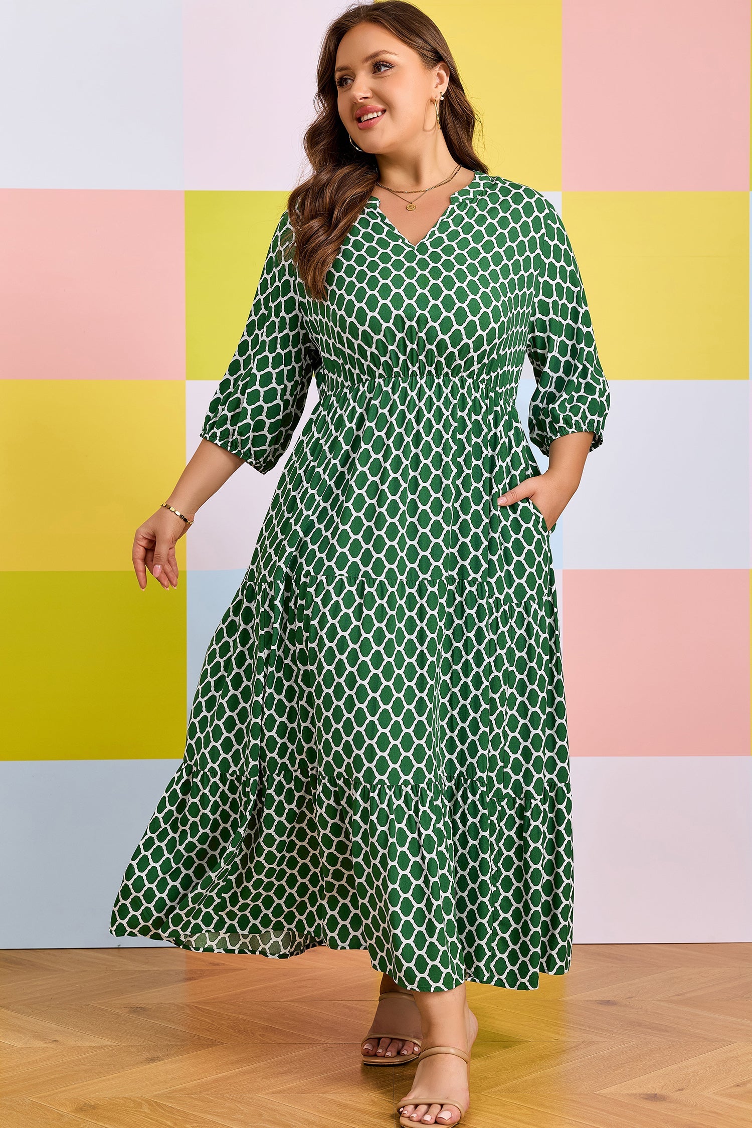 Green geometric-print PLUS casual dress with V-neck and three-quarter sleeves