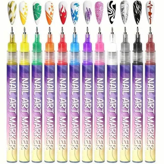 Set of 12 nail art acrylic paint marker pens in assorted colors with tips visible