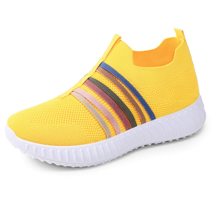 Breathable mesh slip-on sneakers, yellow knit upper with striped bands and white sole