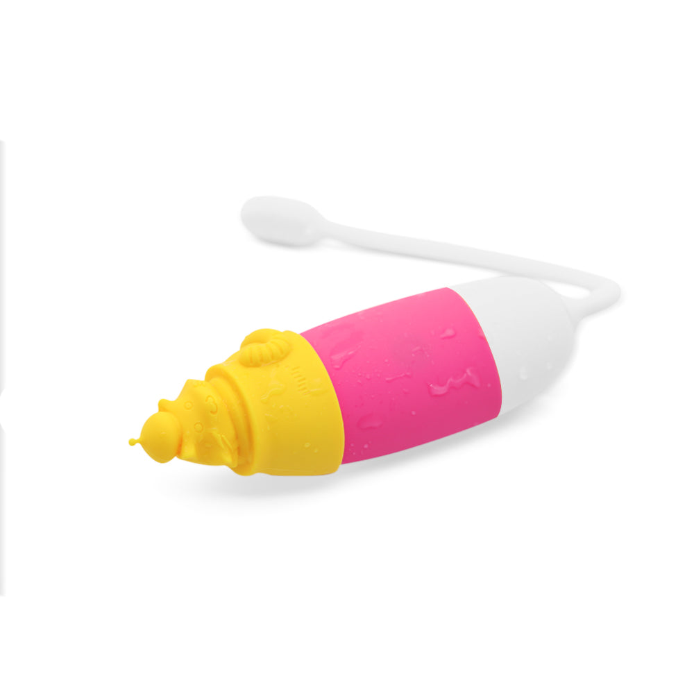 Pink and yellow personal massager with bulb-shaped tip and textured surface