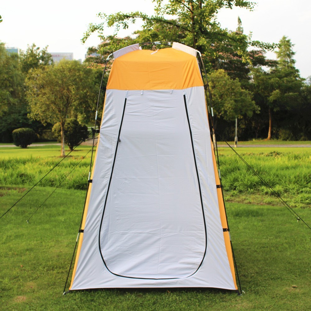 Shower/toilet camping tent with orange top, white walls, zippered front opening
