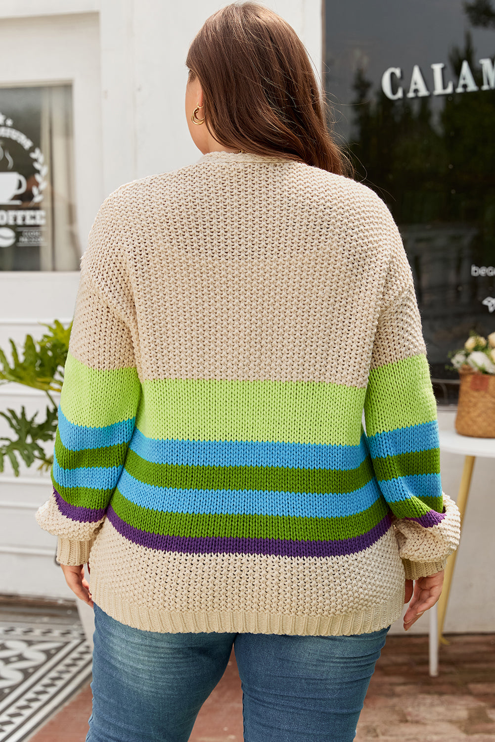 Plus-size crochet open-front cardigan, back view, parchment with green blue and purple stripes