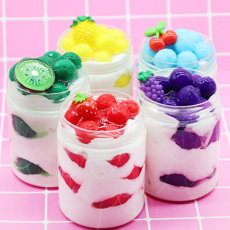 Mixed fruit slime jars with kiwi, cherry, and grape-like toppings