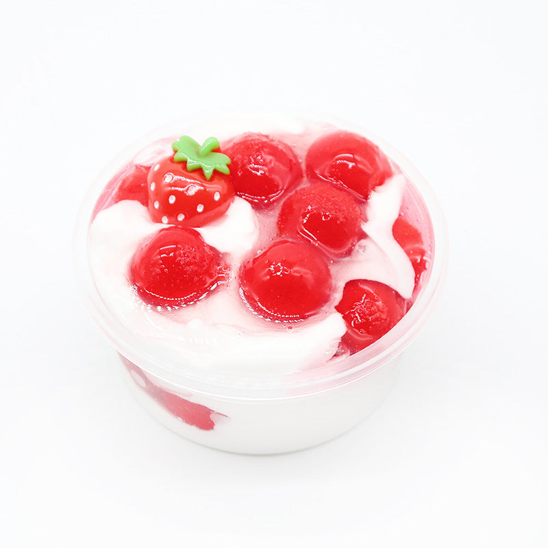 Red slime jar with berry-like pieces and small green star topper