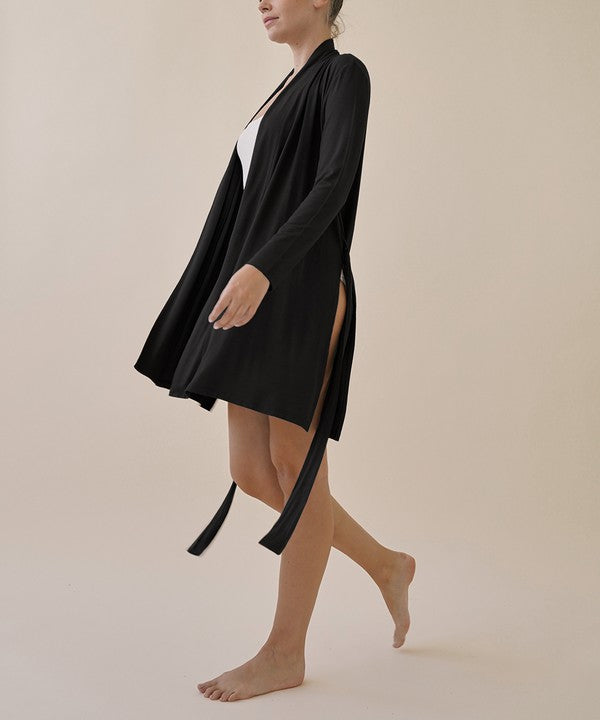 Bamboo robe cardigan in black, open V-neck with waist ties, long sleeves, short length.
