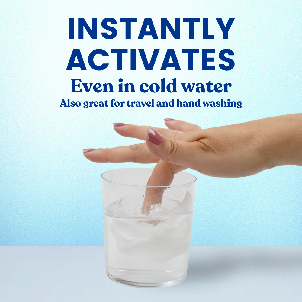 Sensitive skin laundry detergent sheet dissolving in cold water in a clear glass