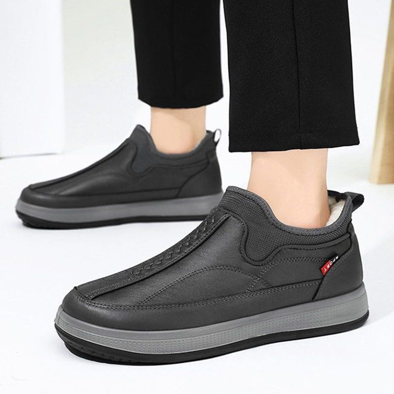 Dark gray slip-on ankle boots with fleece lining and platform rubber sole