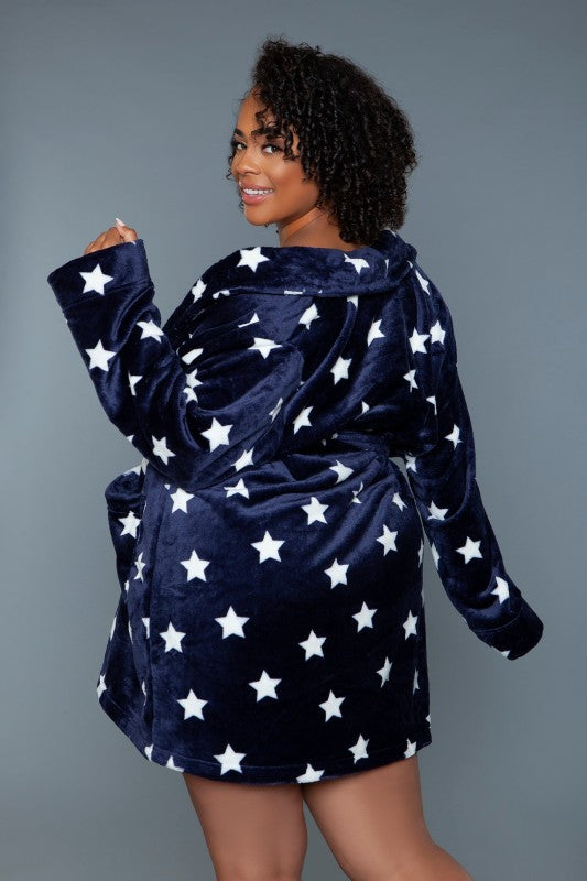 Kaylee robe in navy with white stars, hooded back drape, tie belt, side-turned view