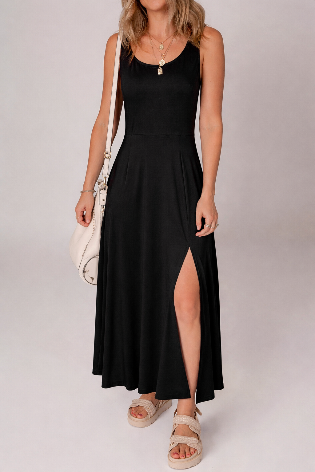 Black sleeveless flared midi dress with scoop neckline and front side slit
