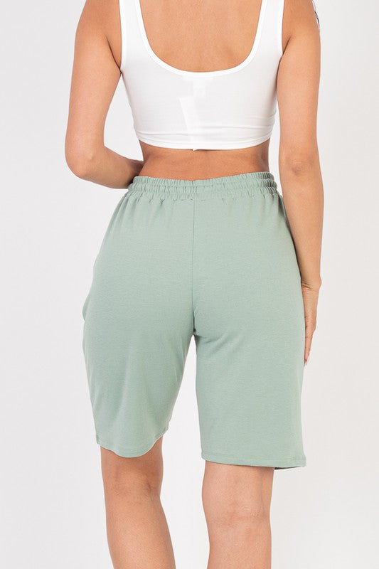 French terry bermuda shorts in mint green, elastic waist with drawstring ties