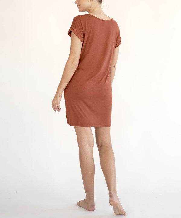 Bamboo crop dress with pockets in rust, back/side view with straight hem