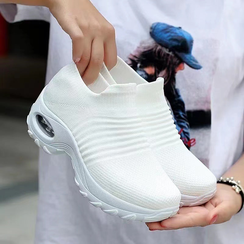 White knit slip-on sneakers with gray air-cushion window and cushioned sole