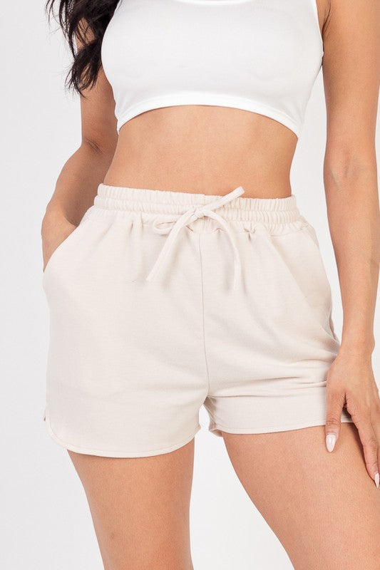 White French terry active shorts with elastic waistband and drawstring tie