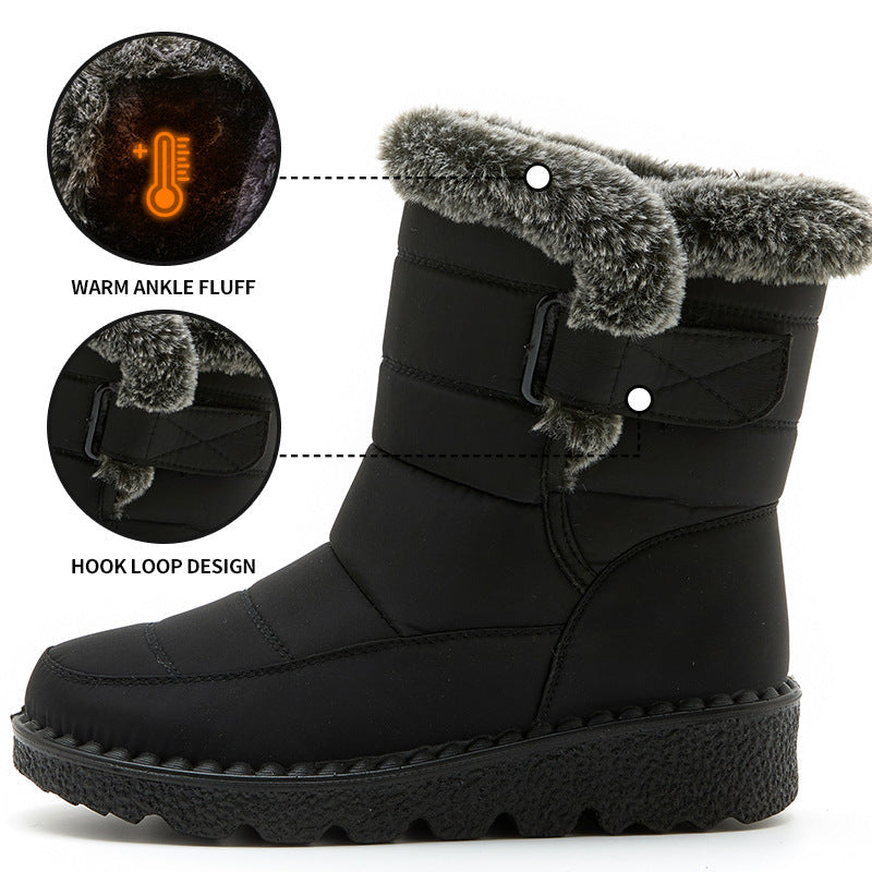 Black ankle snow boots with faux-fur trim and hook-and-loop closure, platform tread sole