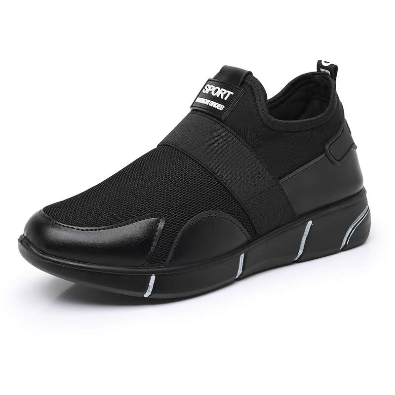Black slip-on walking sneaker with elastic gore, sport patch, and grippy rubber sole