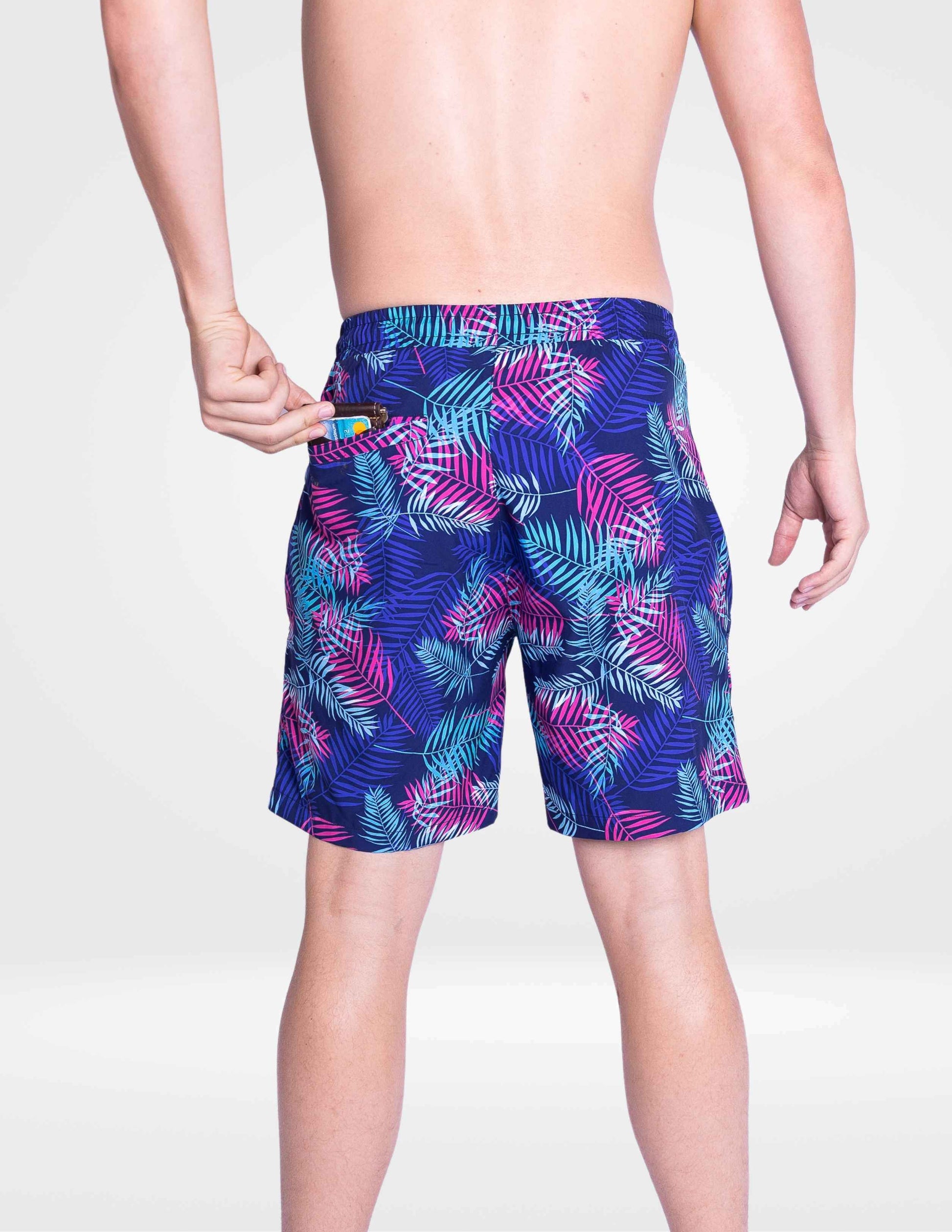 Men's swim shorts with blue leaf print, back view, and elastic waistband with drawstring