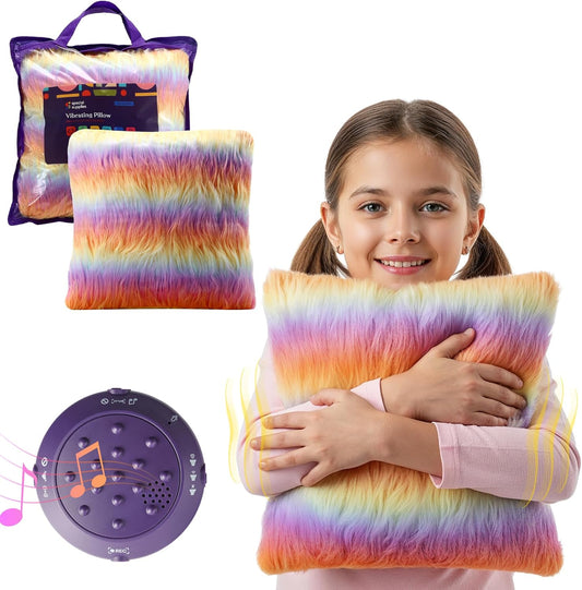 Rainbow plush sensory vibrating pillow with purple fabric back and carry handle