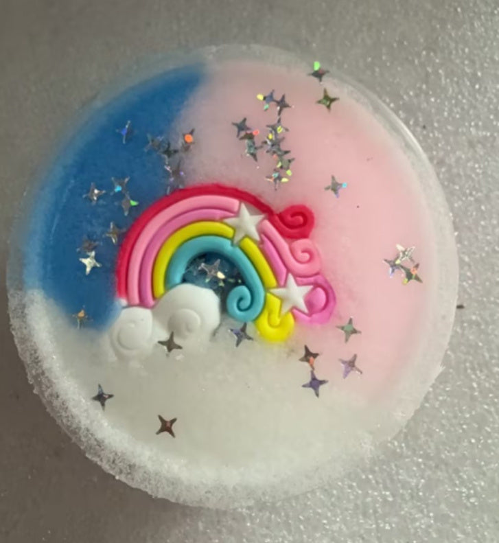 Rainbow unicorn cloud topper in pastel pink and blue slime cup with star sprinkles