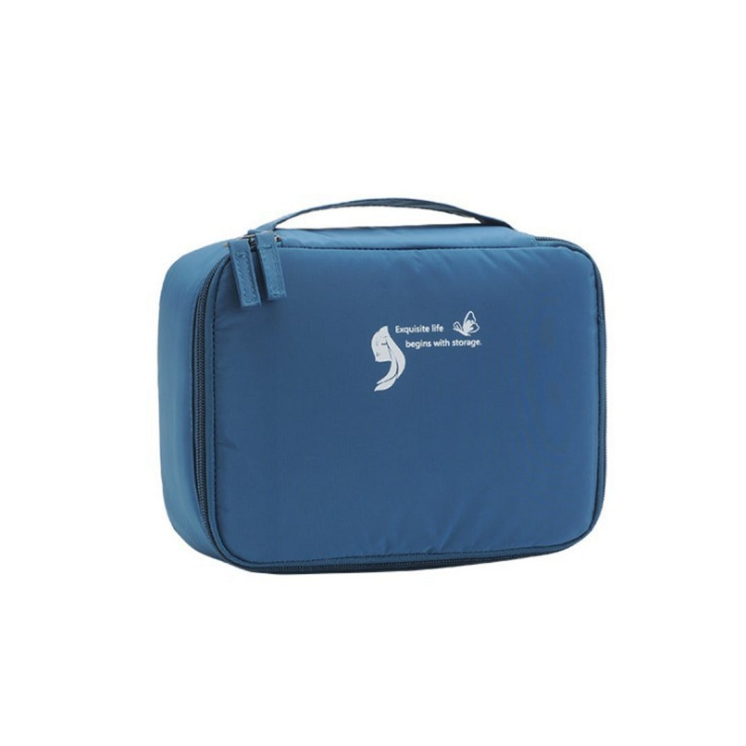 Blue square waterproof makeup/toiletry bag with zippered top and carrying handle.