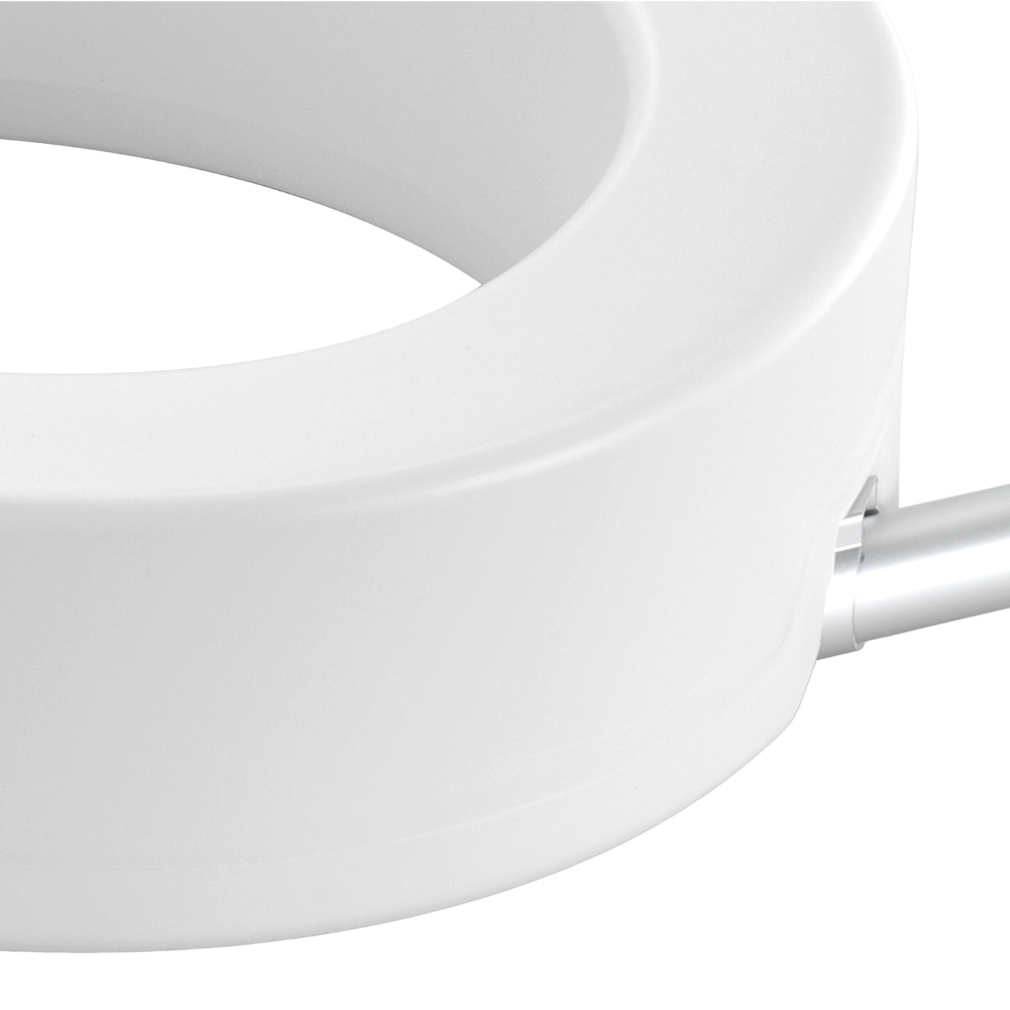 Raised toilet seat close-up of white seat rim and side support structure