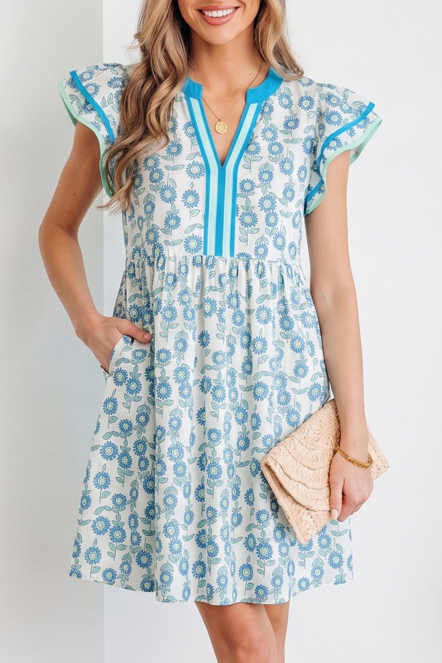 Sky blue mini dress with flutter sleeves and blue-trim V placket, floral pattern