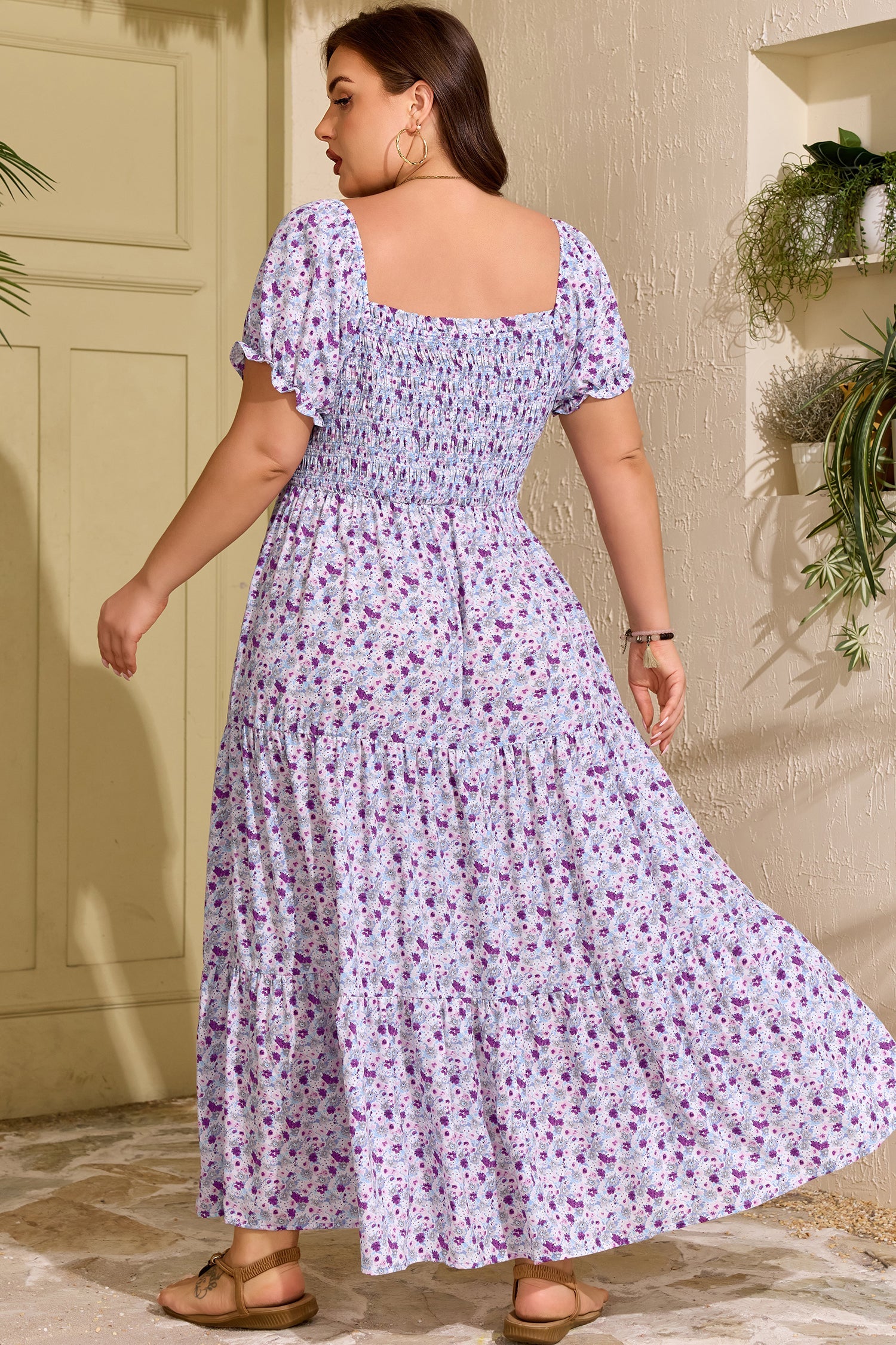 Purple floral smocked maxi dress, square neckline with puff sleeves and flowing tiered skirt