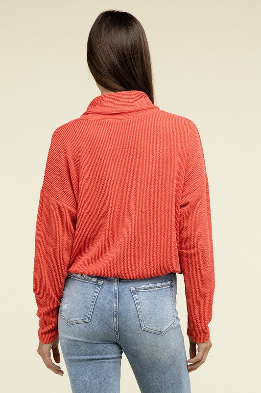 Tomato textured pullover top back with long sleeves and elastic hem