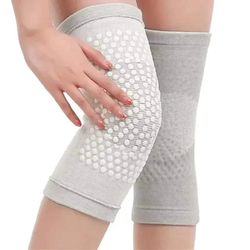 Self-heating knee support pads, light gray fabric with white dotted grip panel