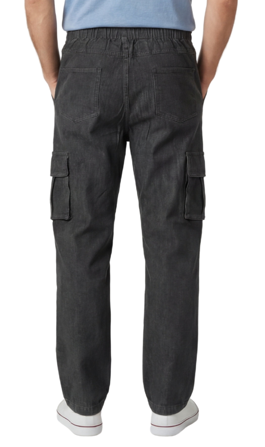 Person wearing black cargo pants on a white background