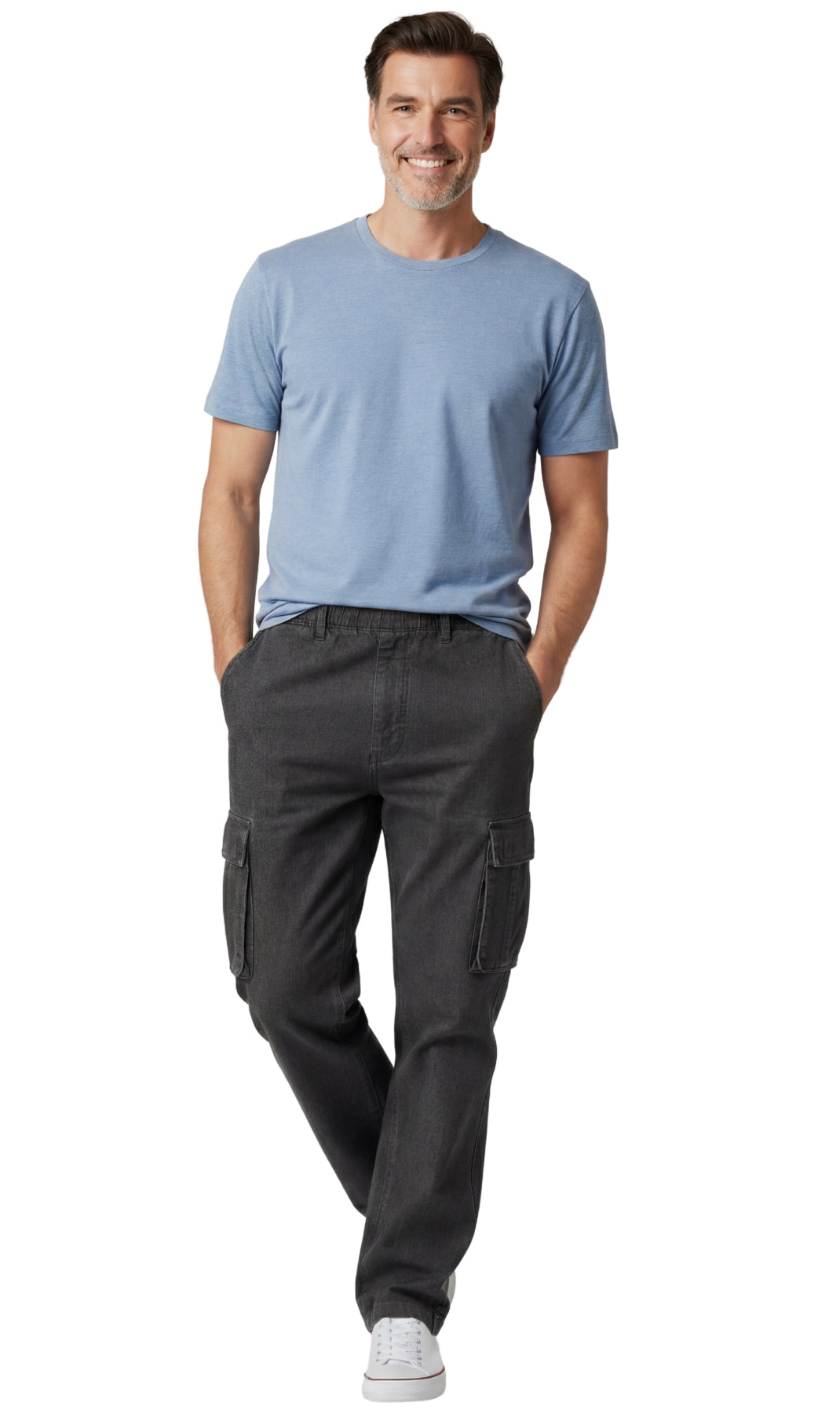 Man wearing a light blue t-shirt and dark gray cargo pants on a white background